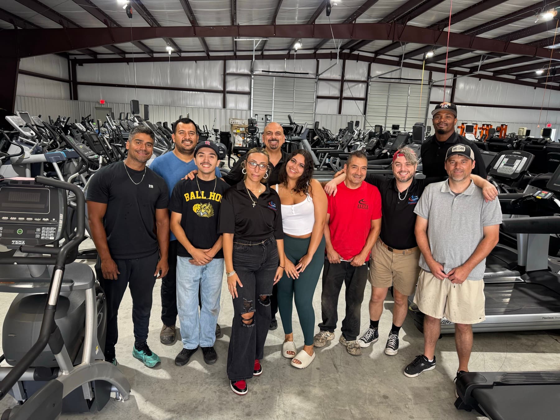 The Second Chance Cardio team in the Buford showroom
