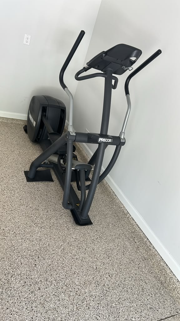 A Precor elliptical in a customer's home gym